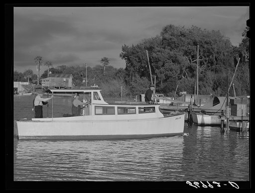 Docking boat at Sarasota trailer park pier. Sarasota, Florida