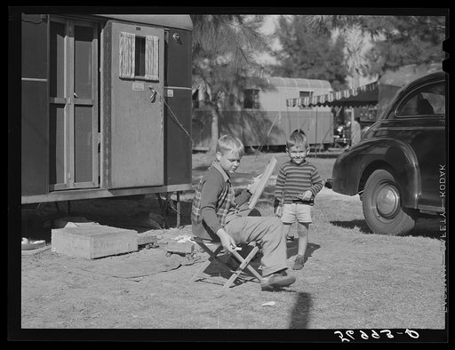 Untitled photo, possibly related to: Children playing outside their trailer homes at Sarasota trailer park. Sarasota, Florida