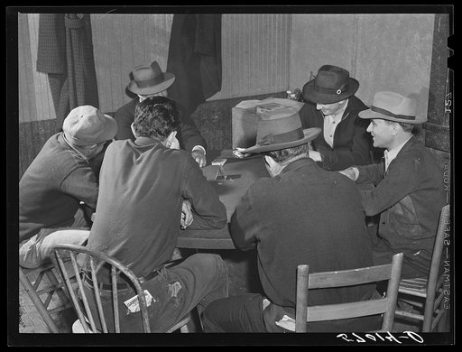 Muskrat trappers playing "cache," a form of poker, in a bar after a fur sale. Delacroix Island, Saint Bernard Parish, Louisiana