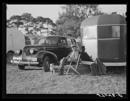 Guest of Sarasota trailer park sitting outside his trailer home. Sarasota, Florida