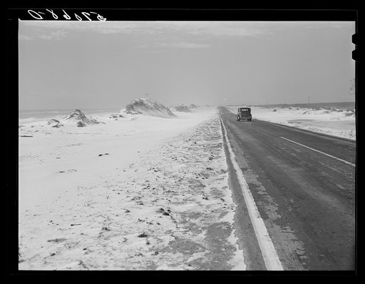 Sand dunes along highway from Pensacola, Florida, along the gulf