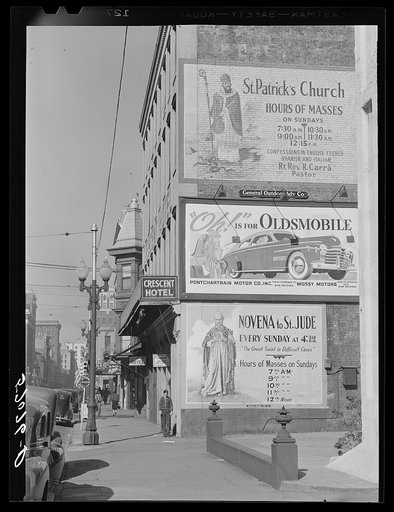 Billboards on side of building. New Orleans, Louisiana