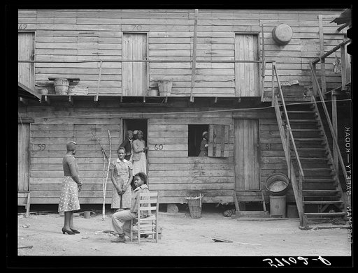 Pahokee "hotel" housing for Negro migratory vegetable pickers and laborers. Pahokee, Florida