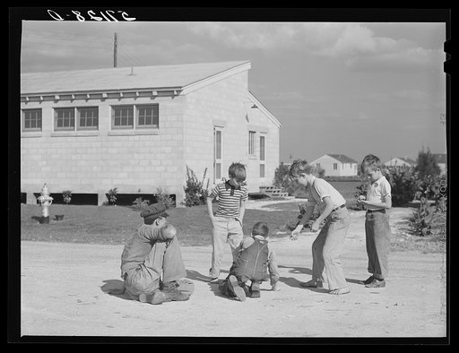Children agricultural workers playing. Osceola migratory labor camp, Belle Glade, Florida