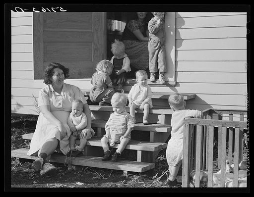 Agricultural workers' children outside the twenty-four hour a day nursery at Osceola migratory labor camp. Belle Glade, Florida