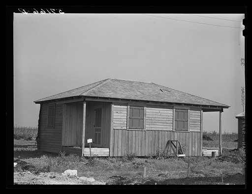New agricultural workers' labor homes under construction at new camp being built by FSA (Farm Security Administration). Pahokee, Florida