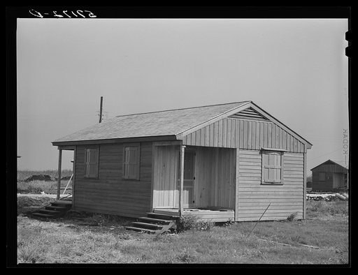 New agricultural workers' labor homes under construction at new camp being built by FSA (Farm Security Administration). Pahokee, Florida