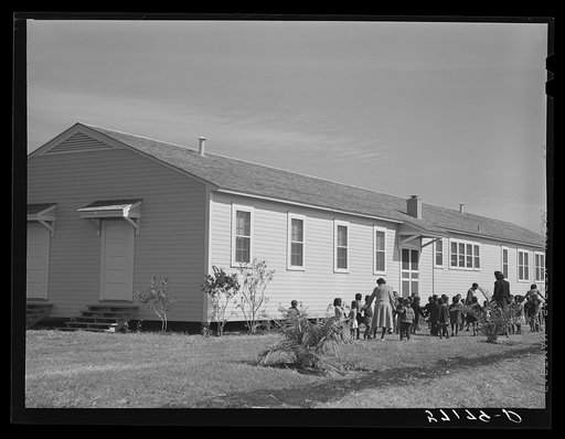 Children of migratory laborers outside of day nursery at Okeechobee migratory labor camp. Belle Glade, Florida