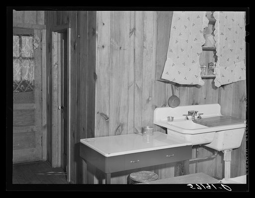 Interior of labor home for agricultural workers in Okeechobee migratory labor camp. Belle Glade, Florida