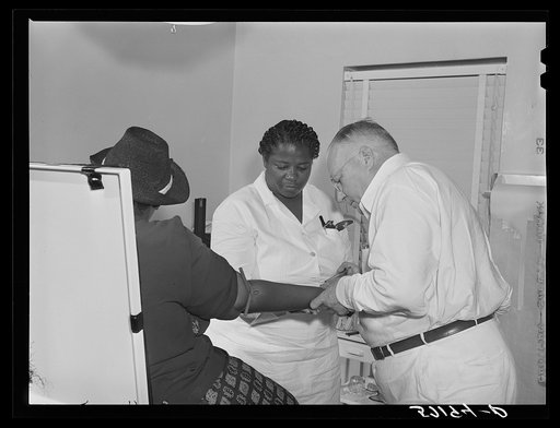 Health clinic for agricultural workers at Okeechobee migratory labor camp. Belle Glade, Florida