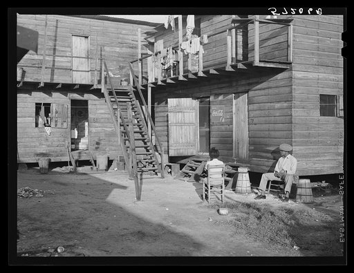 "Hotel" in Pahokee, Lake Okeechobee, Florida, living quarters for migratory agricultural workers