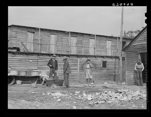 Untitled photo, possibly related to: Pahokee "hotel" housing for Negro migratory vegetable pickers and laborers. Pahokee, Florida