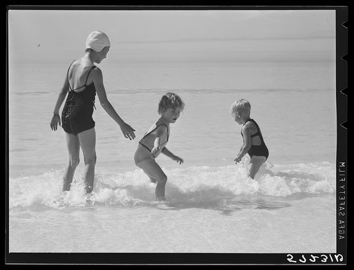 Guests of Sarasota trailer park, Sarasota, Florida, going in for a swim