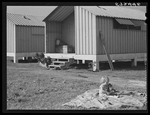 Metal shelters for agricultural workers at Osceola migratory labor camp. Belle Glade, Florida