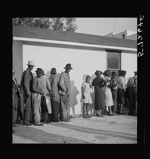 Untitled photo, possibly related to: Migratory workers waiting to receive supplies of surplus commodities. Belle Glade, Florida