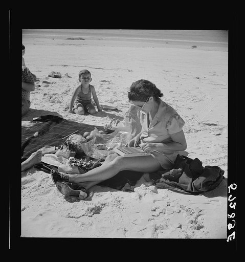 Guest of Sarasota trailer park, Sarasota, Florida, at the beach with her family