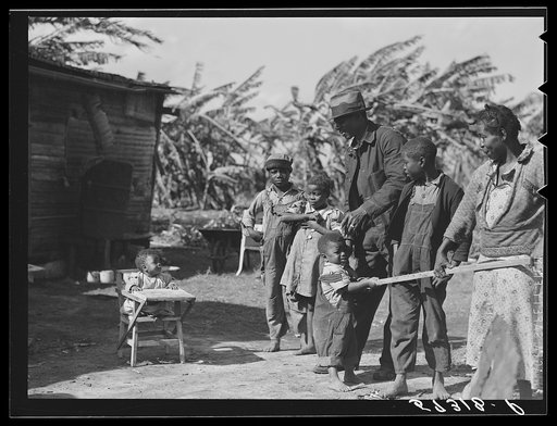 Untitled photo, possibly related to: Living quarters, store, and "juke joint" for migratory laborers near Canal Point, Florida