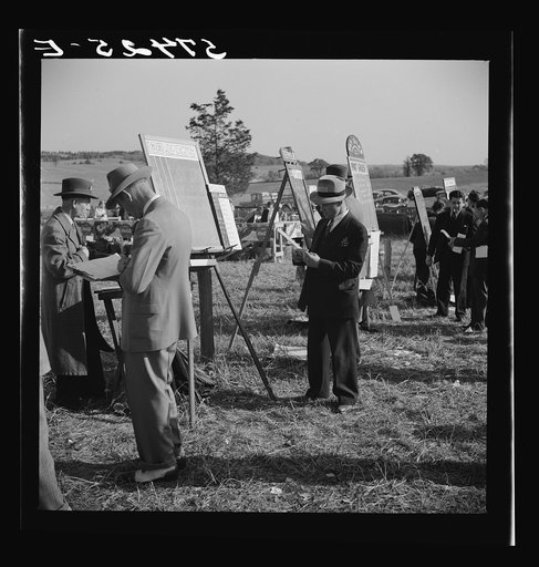 Untitled photo, possibly related to: Bookies taking bets at horse races. Warrenton, Virginia