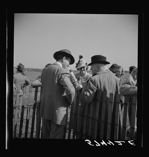 Looking at the gold cup. Horse races at Warrenton, Virginia