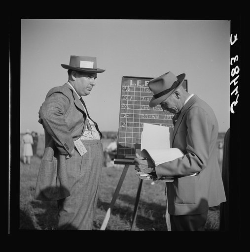 Bookies taking bets at horse races. Warrenton, Virginia