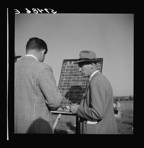 Bookies taking bets at horse races. Warrenton, Virginia
