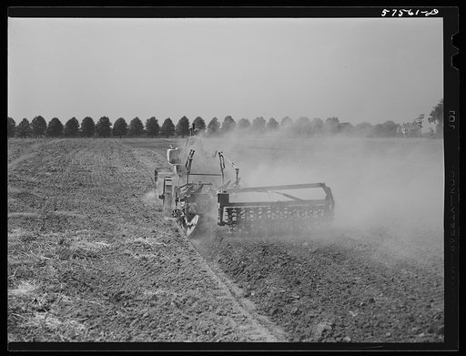 Harrowing field before planting. Starkey Farms, Morrisville, Pennsylvania