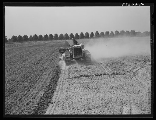 Harrowing field before planting. Starkey Farms, Morrisville, Pennsylvania