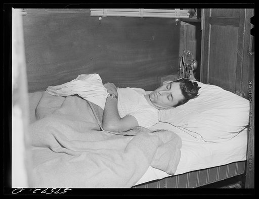 East Hartford, Connecticut. Frank Robbins of Wareham, Massachusetts, employed at the United Aircraft plant, lives in trailer near the plant, with his wife and four children, because of the housing shortage. He works nights, so he can sleep during the day in a bed used at night by two of the children