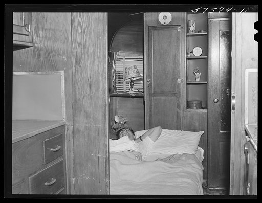 Untitled photo, possibly related to: Frank Robbins of Wareham, Massachusetts, employed at United Aircraft, East Hartford, Connecticut, lives in trailer near plant, with wife and four children because of housing shortage. He works nights, so he can sleep days in a bed used at night by the children. H