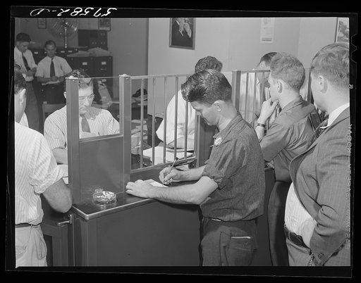 Pratt and Whitney worker at the United Aircraft credit union. East Hartford, Connecticut