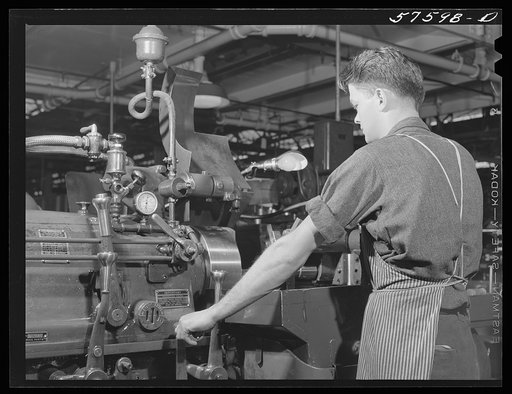 Rolfe Lawrence Chickering, farmboy from Saint Johnsbury, Vermont, who came to work at Pratt and Whitney United Aircraft in January 1941. Because of congested housing conditions, he commutes twenty miles each way daily from East Hartford to Suffield, Connecticut, where he lives with a private family,