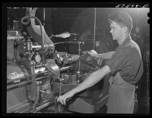 Untitled photo, possibly related to: Rolfe Lawrence Chickering, farmboy from Saint Johnsbury, Vermont, who came to work at Pratt and Whitney United Aircraft in January 1941. Because of congested housing conditions, he commutes twenty miles each way daily from East Hartford to Suffield Connecticut, w