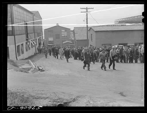 Workers coming out of the electric boat works at the afternoon change of shift. Groton, Connecticut