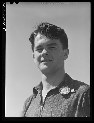 Rolfe Lawrence Chickering, farmboy from Saint Johnsbury, Vermont, who came to work at Pratt and Whitney United Aircraft in January 1941. Because of congested housing conditions, he commutes twenty miles each way daily from East Hartford to Suffield, Connecticut, where he lives with a private family,