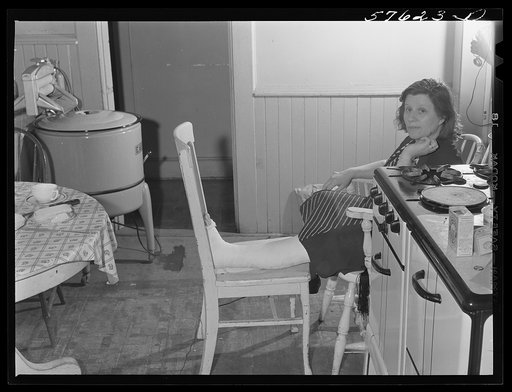 Untitled photo, possibly related to: Home of Mr. and Mrs. William McCarthy. He works at Arrows Hart-Hageman Electric Company, and they are natives of Hartford, Connecticut. His wife broke her leg and they have to find another apartment, as rents are so high and conditions are crowded