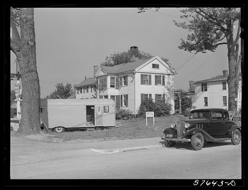 Many private homes in East Hartford, Connecticut are using all of their available yard space for parking areas for defense workers. Often trailers are sold there too