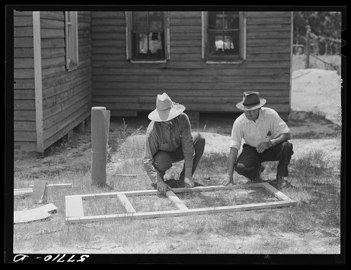 Fastening the stock with corrugated staples. Screen door construction. Charles County, La Plata, Maryland