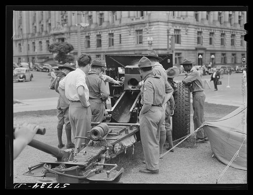 Boy scouts inspecting and learning about Army equipment in Commerce Square, Washington, D.C.