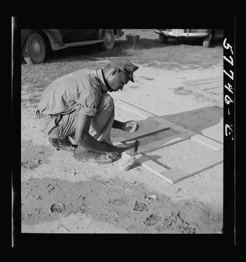 Untitled photo, possibly related to: All joints are cut square and metal reinforced. Demonstration of home screen door construction. Saint Mary's County, Ridge, Maryland
