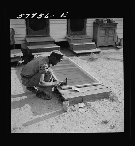 Untitled photo, possibly related to: The screen is tacked on sides. Demonstration of home screen door construction. Saint Mary's County, Ridge, Maryland