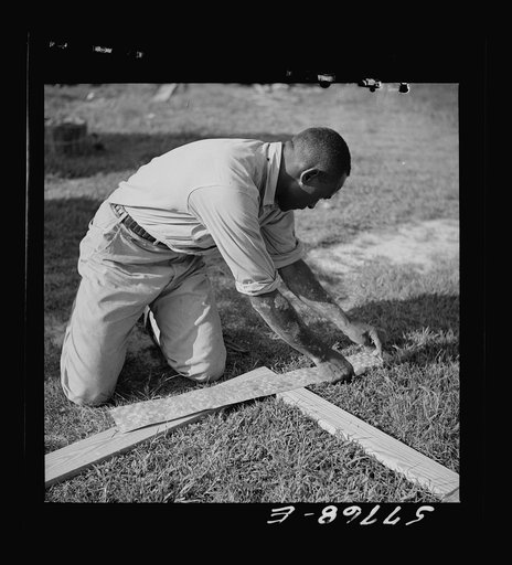 Measuring 24-gauge galvanized metal for cutting into rectangular reinforcements. Screening demonstration. Saint Mary's County, Ridge, Maryland
