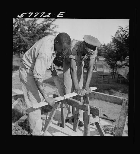 Cutting screen door stock to measurement. Saint Mary's County, Ridge, Maryland. Screening demonstration
