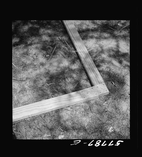 Top joint of screen door frame before assembling with screen wire.  Screening demonstration. Charles County, La Plata, Maryland