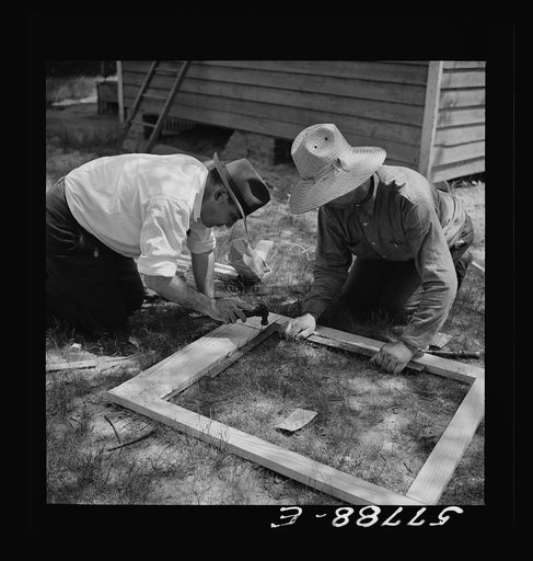 All joints on the outside face are reinforced first. Screen door construction demonstration. Charles County., La Plata, Maryland