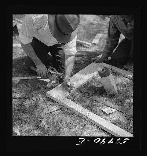 Detail of bottom corner of screen door before applying screen. The bottom piece is 5/4 by 6 inches while the side pieces are 5/4 by 3 inches. Screening demonstration. Charles County, La Plata, Maryland