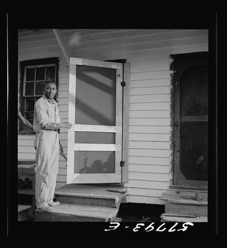 The finished door in place. Demonstration of home screen door construction. Saint Mary's County, Ridge, Maryland