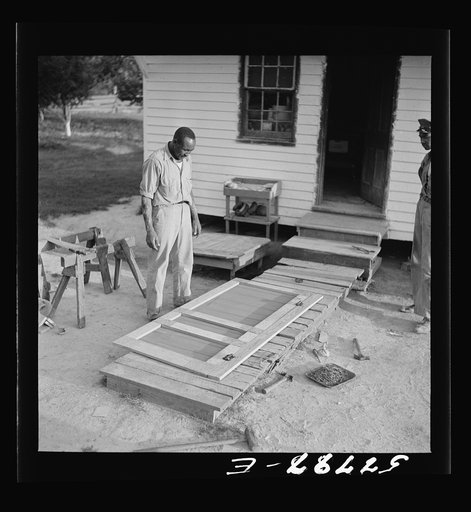 Door ready to be placed. Demonstration of home screen door construction. Saint Mary's County, Ridge, Maryland