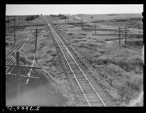 Railroad with grain elevators near Minot, North Dakota