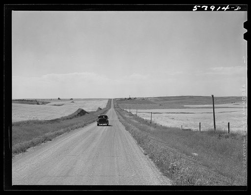 Untitled photo, possibly related to: Highway through wheat ranches near Williston, North Dakota