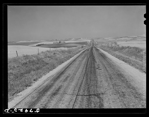 Highway through wheat ranches near Williston, North Dakota